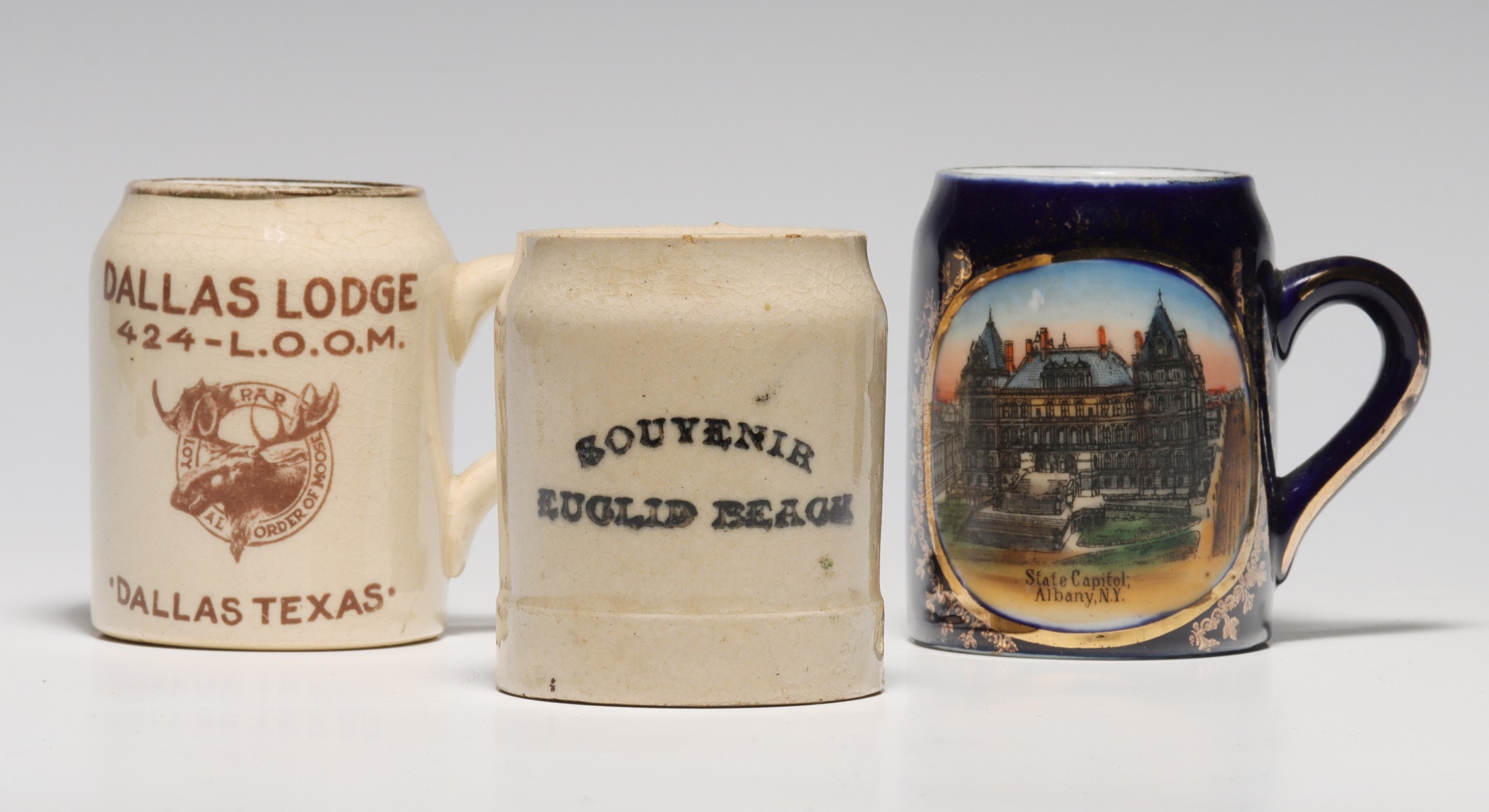 THREE CIRCA 1900 STRIKER MUGS