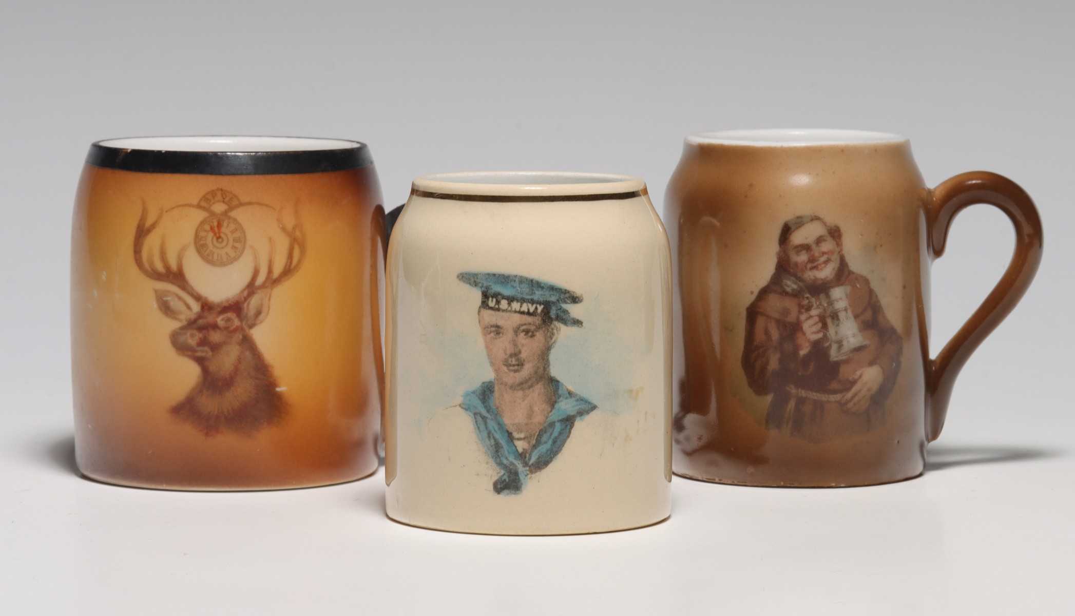 THREE CIRCA 1900 STRIKER MUGS