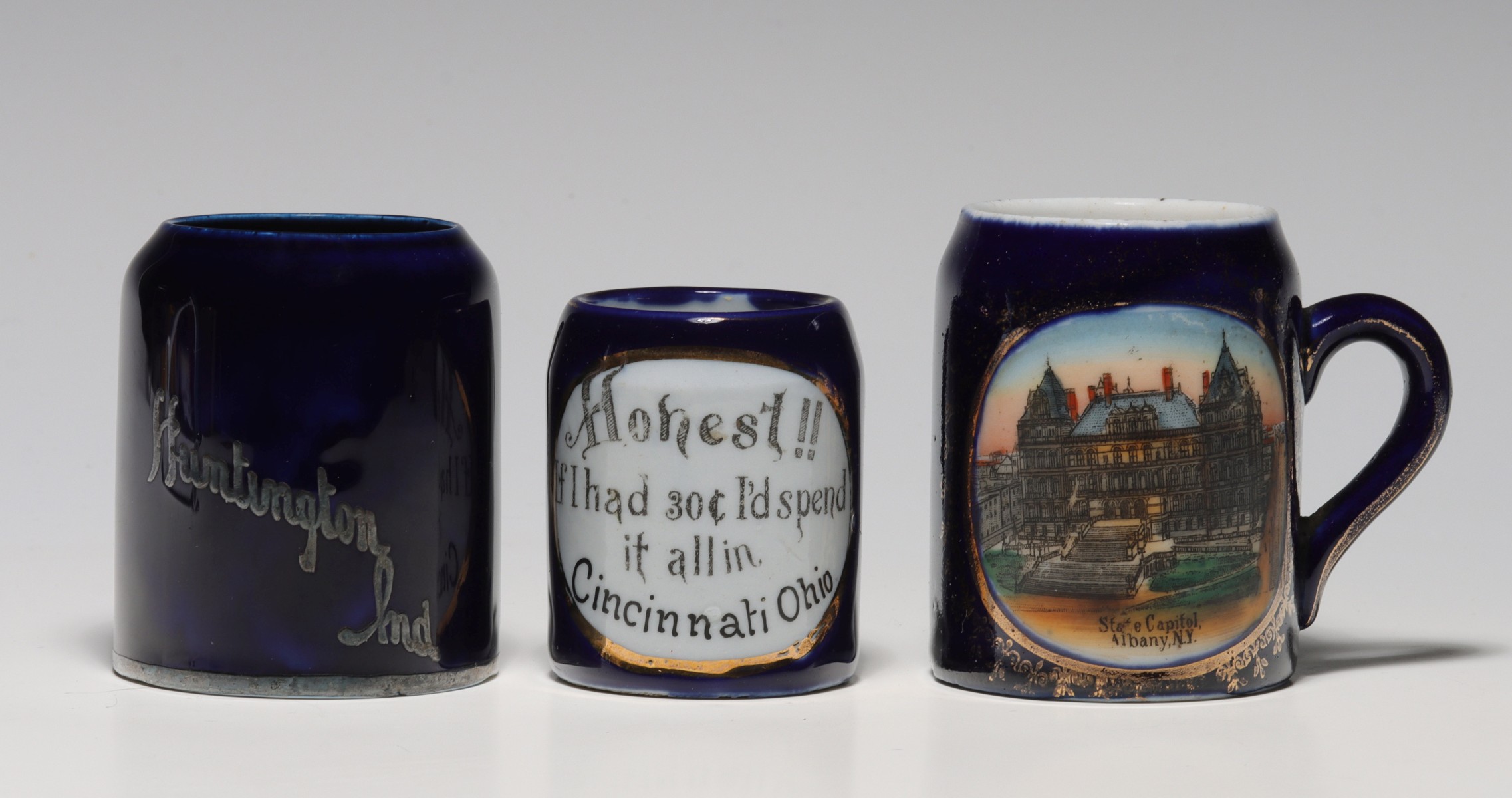 THREE CIRCA 1900 STRIKER MUGS