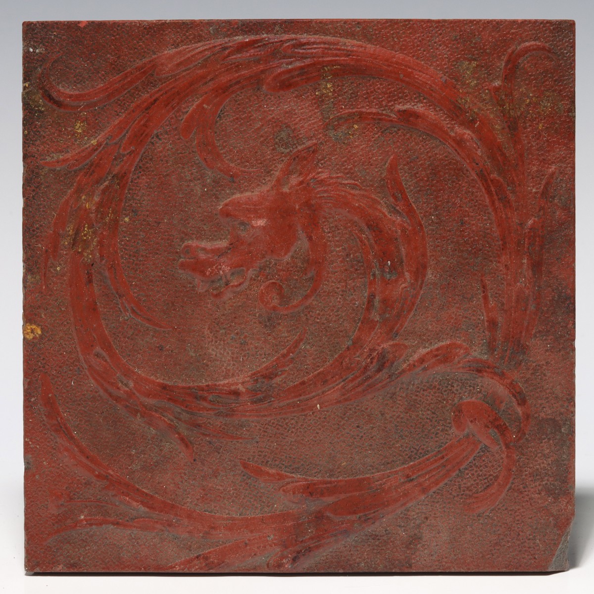 VICTORIAN REDWARE ART POTTERY TILE WITH DRAGON