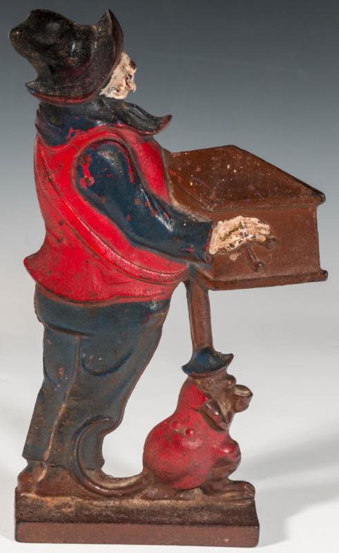 A 1920s CAST IRON ORGAN GRINDER DOORSTOP