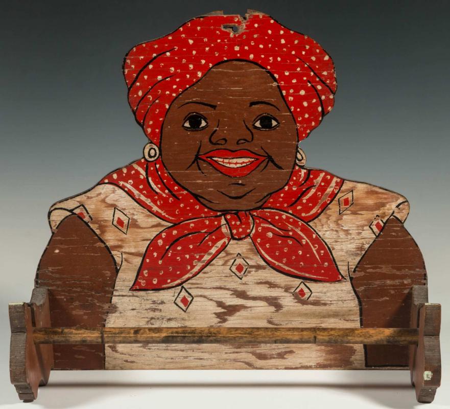 A VINTAGE MAMMY FIGURAL PAINTED WOOD TOWEL RACK