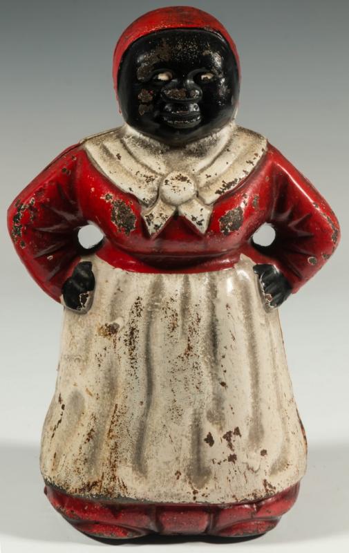 A 20TH CENTURY PAINTED CAST IRON MAMMY DOORSTOP