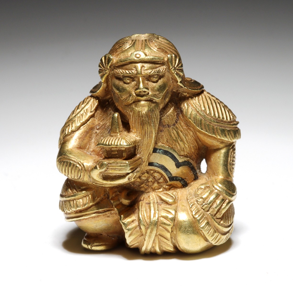 A MEIJI PERIOD HIGH KARAT GOLD OJIME MODEL OF BISHAMON