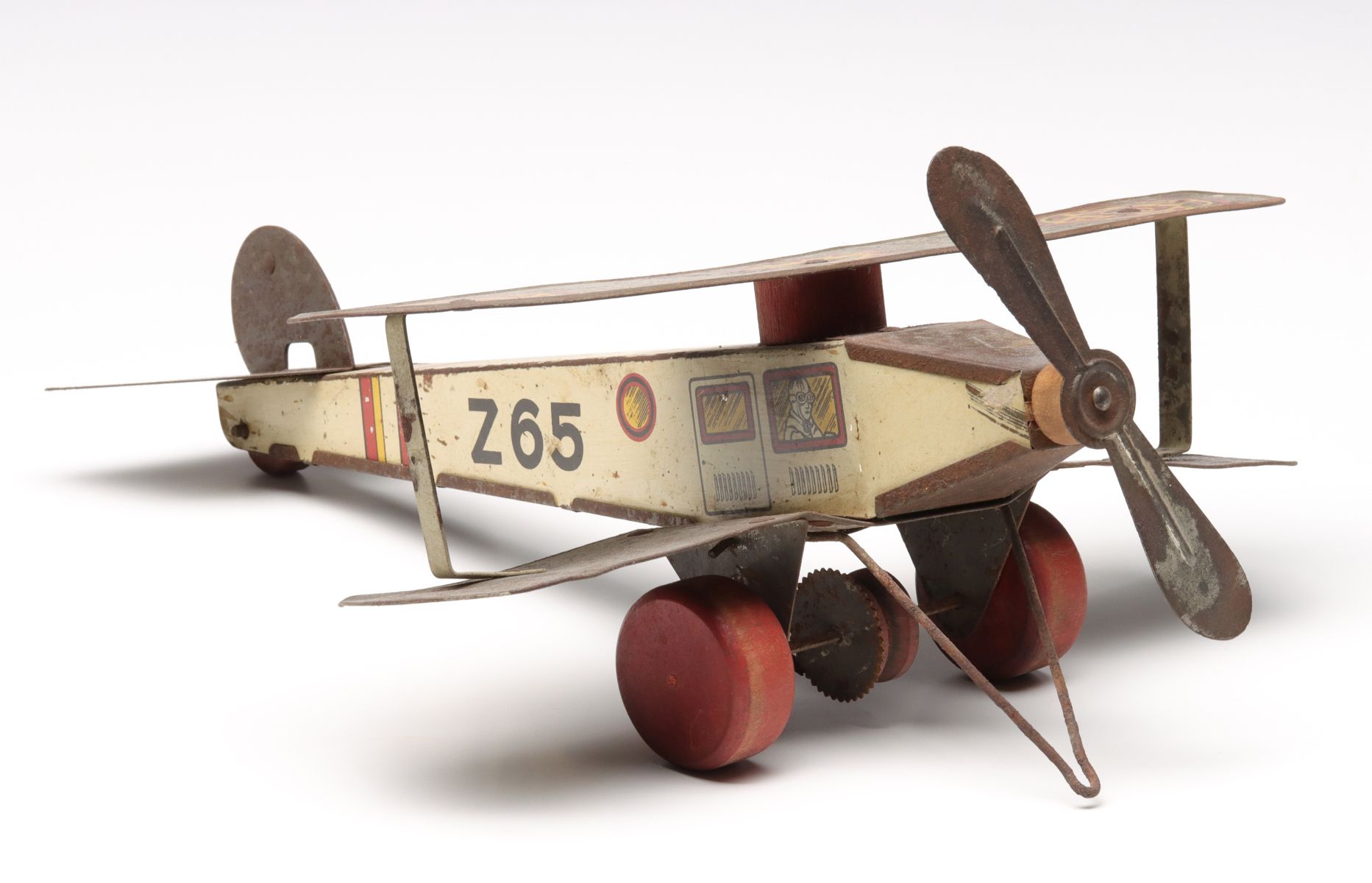 TIN BIPLANE PULL TOY AS FOUND