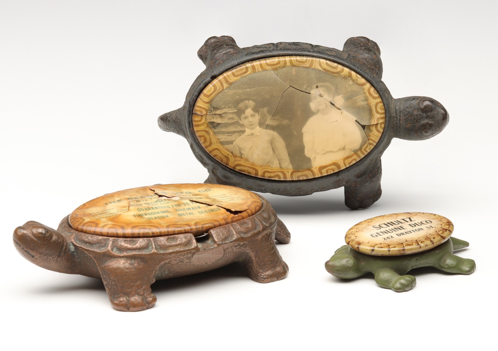 THREE EARLY 20TH CENTURY IRON TURTLE PAPERWEIGHTS