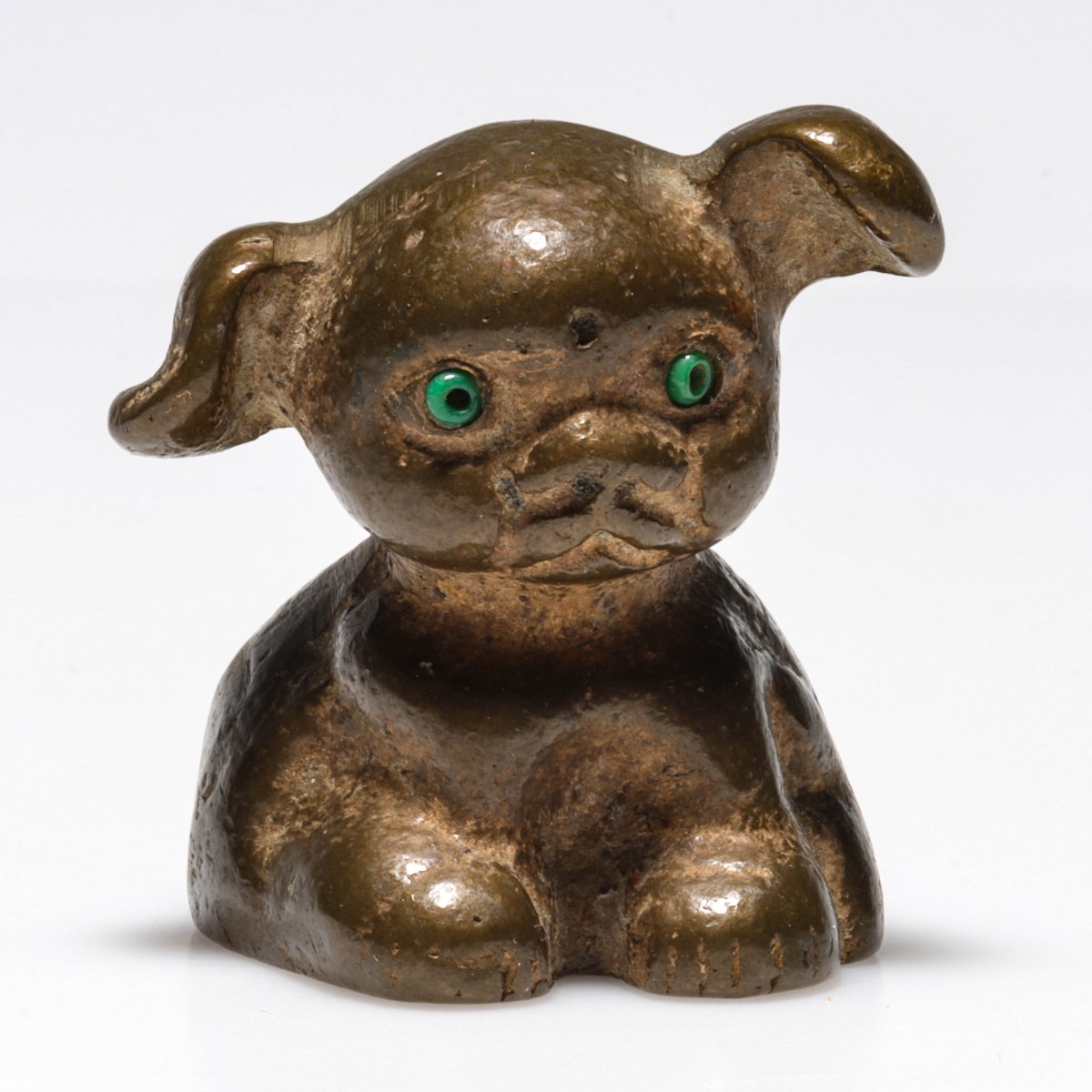 BRASS PUP PAPERWEIGHT WITH INLAID GLASS BEAD EYES