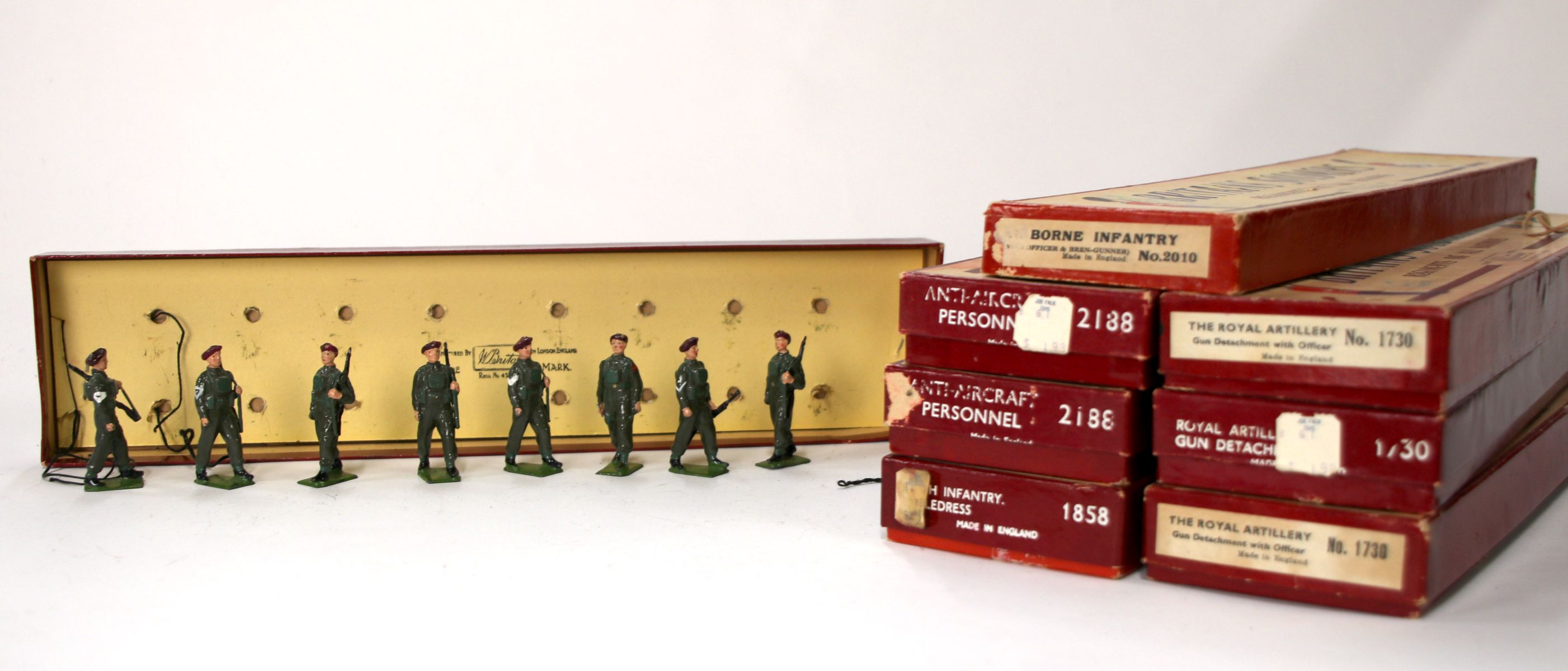 SEVEN SETS OF BRITAINS SOLDIERS WITH R.O.A.N BOXES