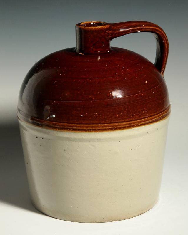 A REDWING STONEWARE JUG