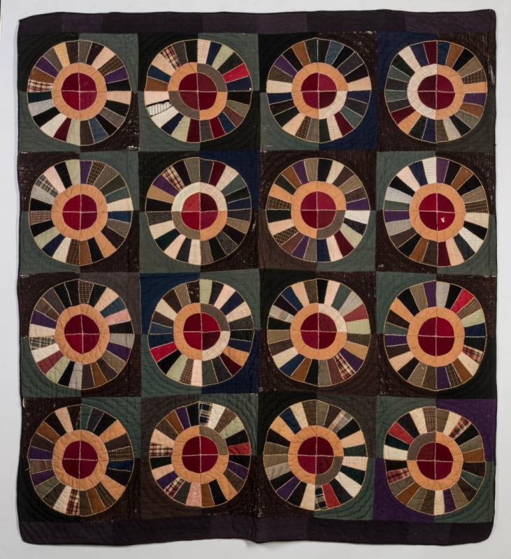 AN UNUSUAL GRANDMOTHER'S FAN BLOCK QUILT