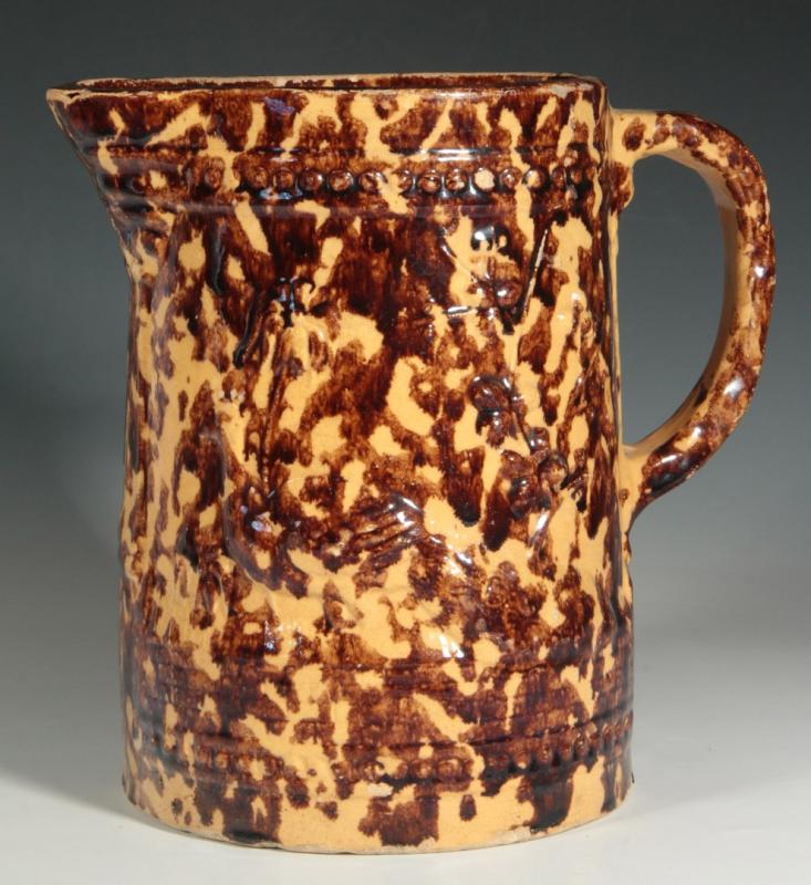 A ROCKINGHAM SPONGE DECORATED PITCHER