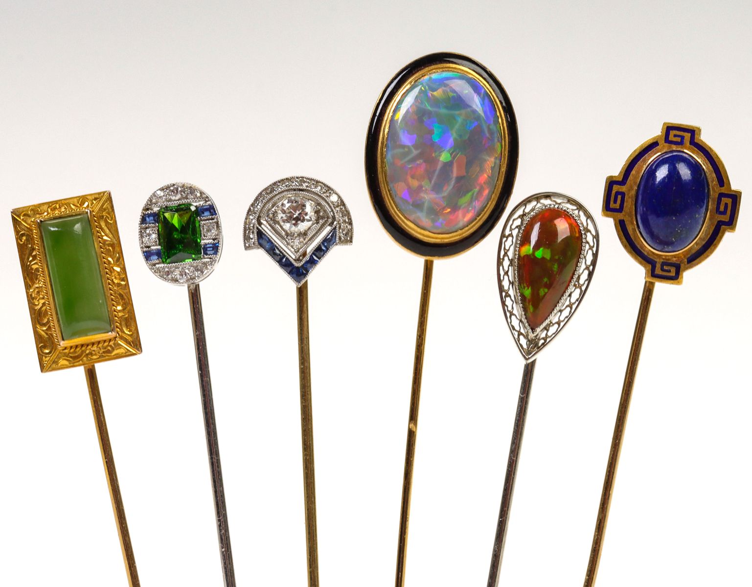 FINE DIAMOND AND RUSSIAN DEMANTOID GARNET STICK PINS