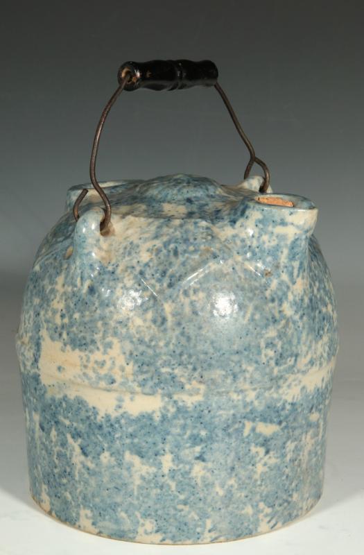 A BLUE SPONGEWARE SYRUP JUG ATTRIBUTED F.H. WEEKS