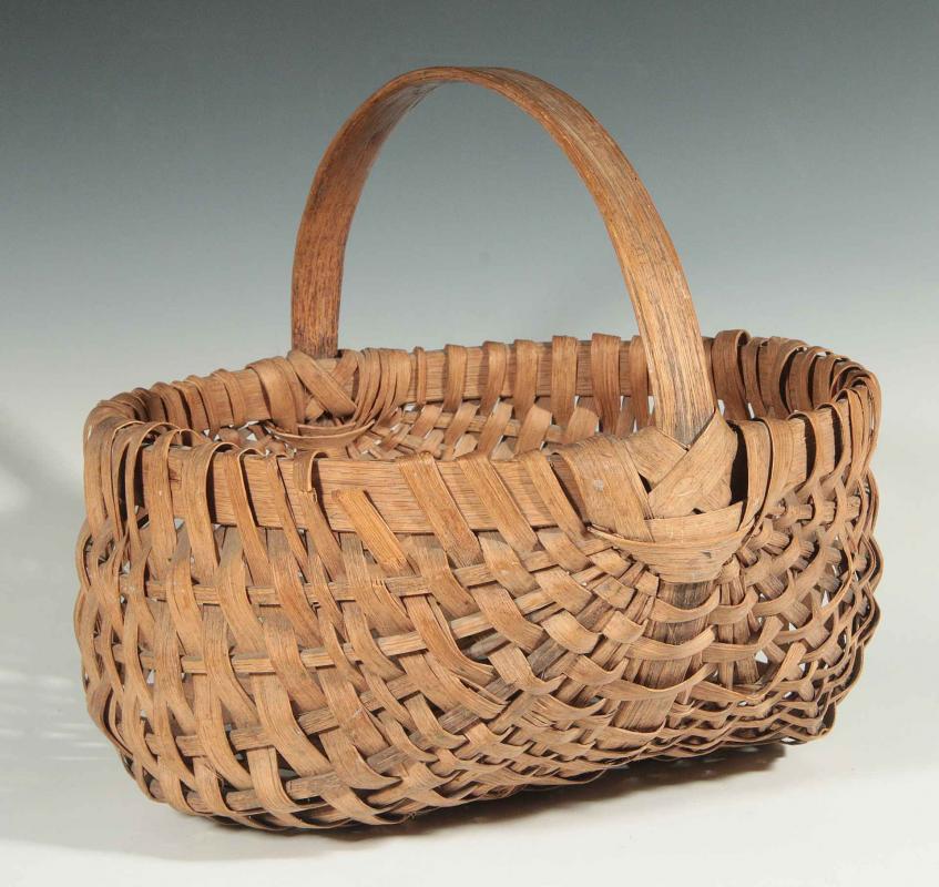 AN ANTIQUE AMERICAN SPLINT BASKET