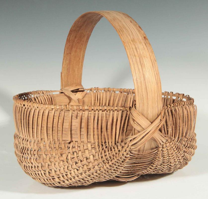 AN ANTIQUE AMERICAN OAK SPLINT BASKET