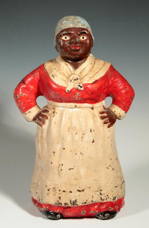 AN ORIGINAL CAST IRON AUNT JEMIMA DOORSTOP