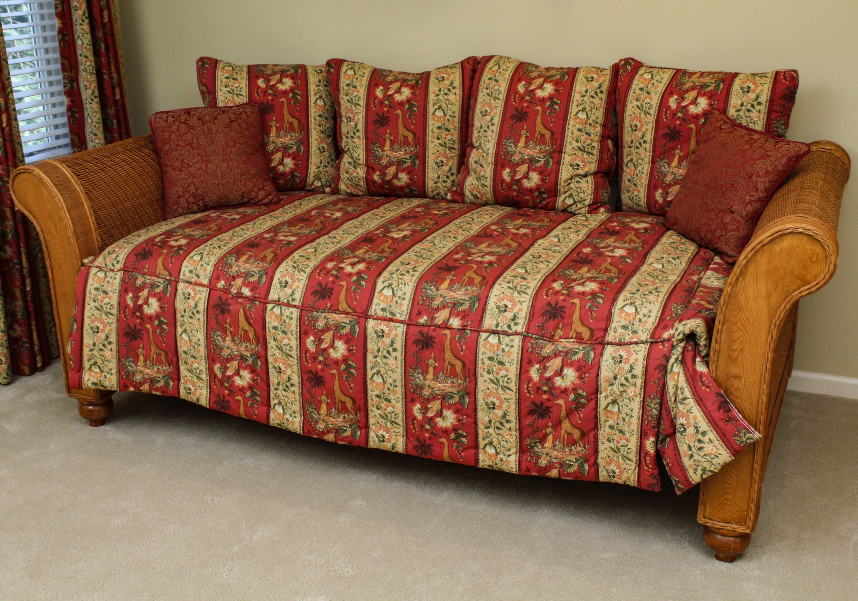 AN EXTRA CLEAN MODERN WICKER SLEIGH FORM DAY BED