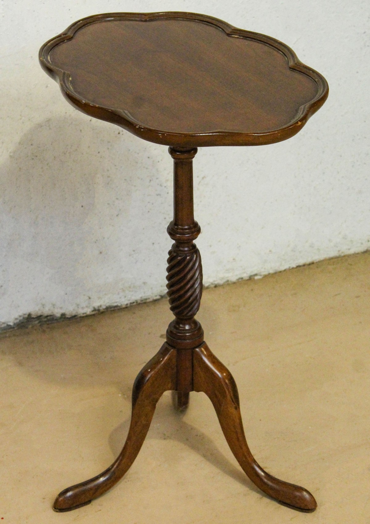 A CONTEMPORARY TRIPOD STAND TABLE