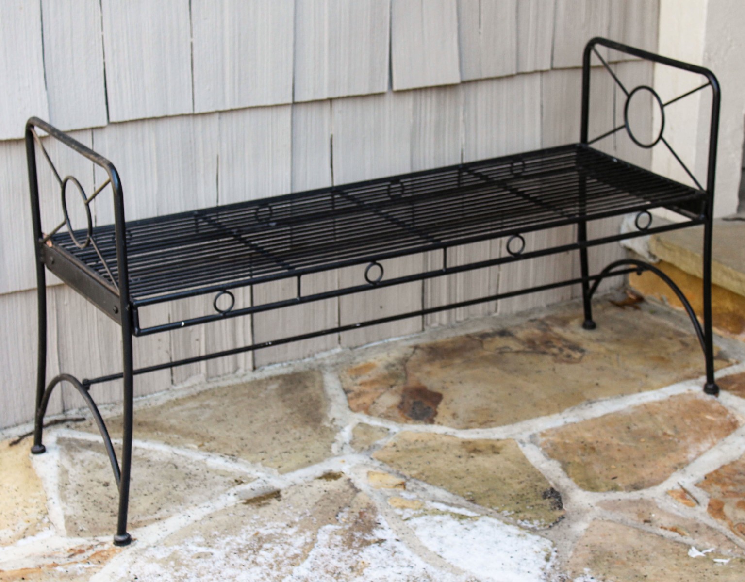 A NICE PENCIL ROD IRON PATIO BENCH