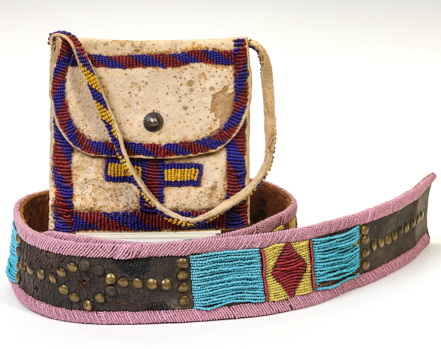 CIRCA 1900 PLATEAU REGION BEADED PANEL BELT AND BAG