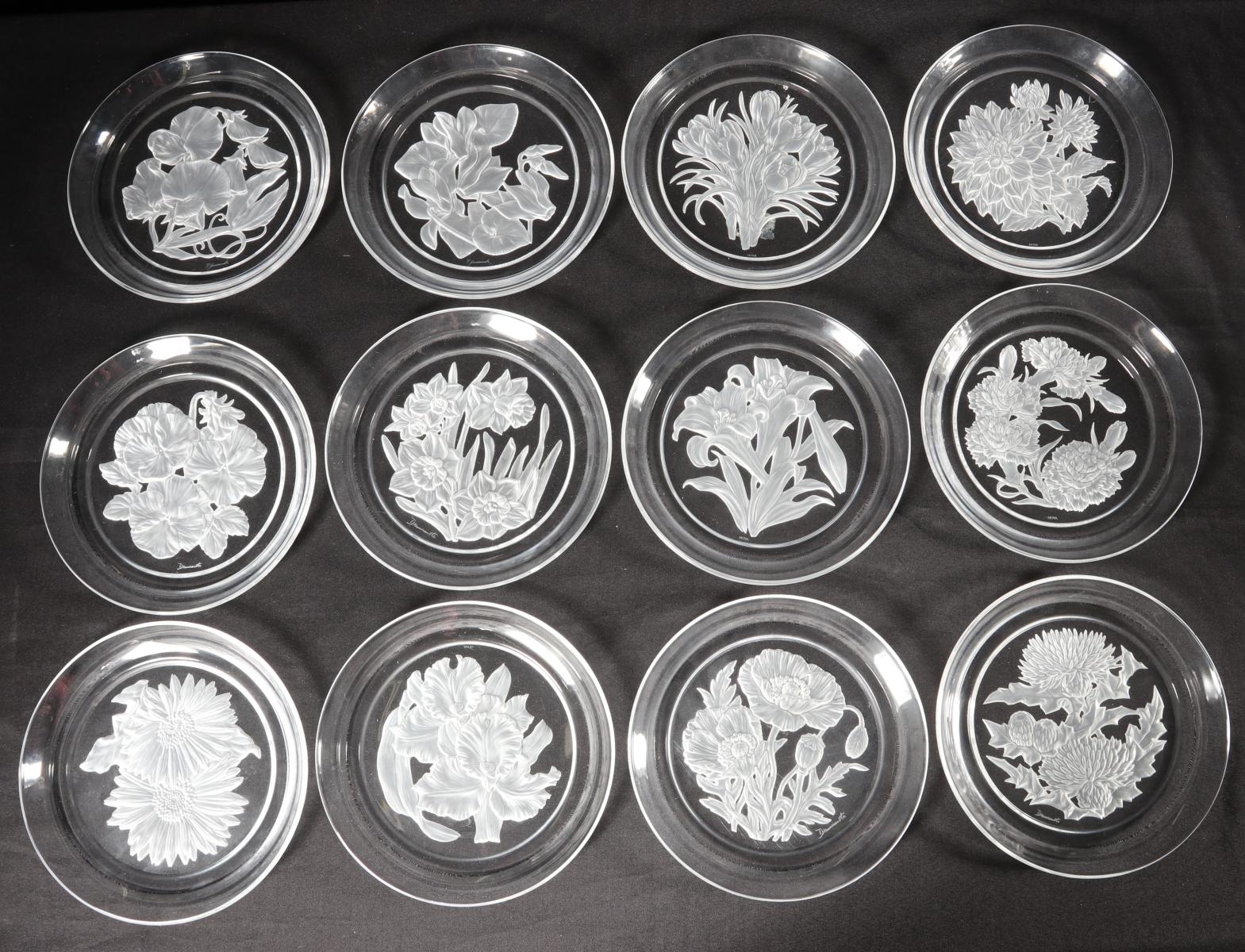 TWELVE HOYA CRYSTAL FLOWER PLATES