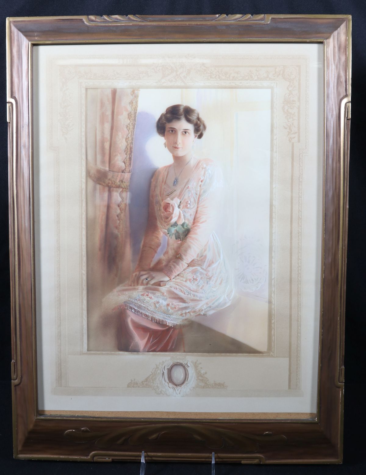 A BEAUTIFUL HAND TINTED PORTRAIT WITH ELABORATE MAT