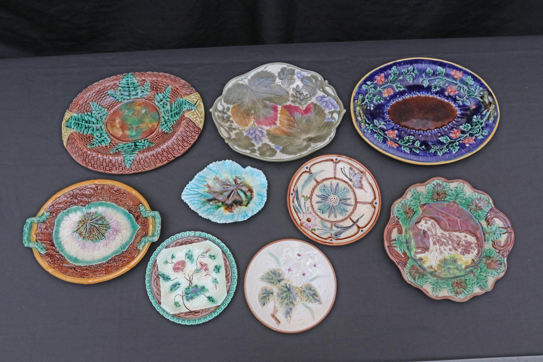 NINE ANTIQUE MAJOLICA PLATES AND TRAYS