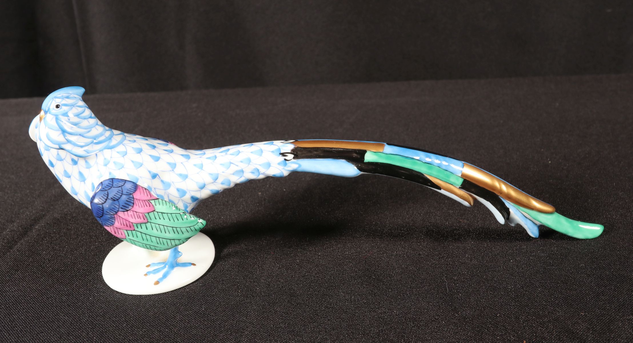 A HEREND BLUE FISHNET FIGURE OF LONG-TAILED PHEASANT