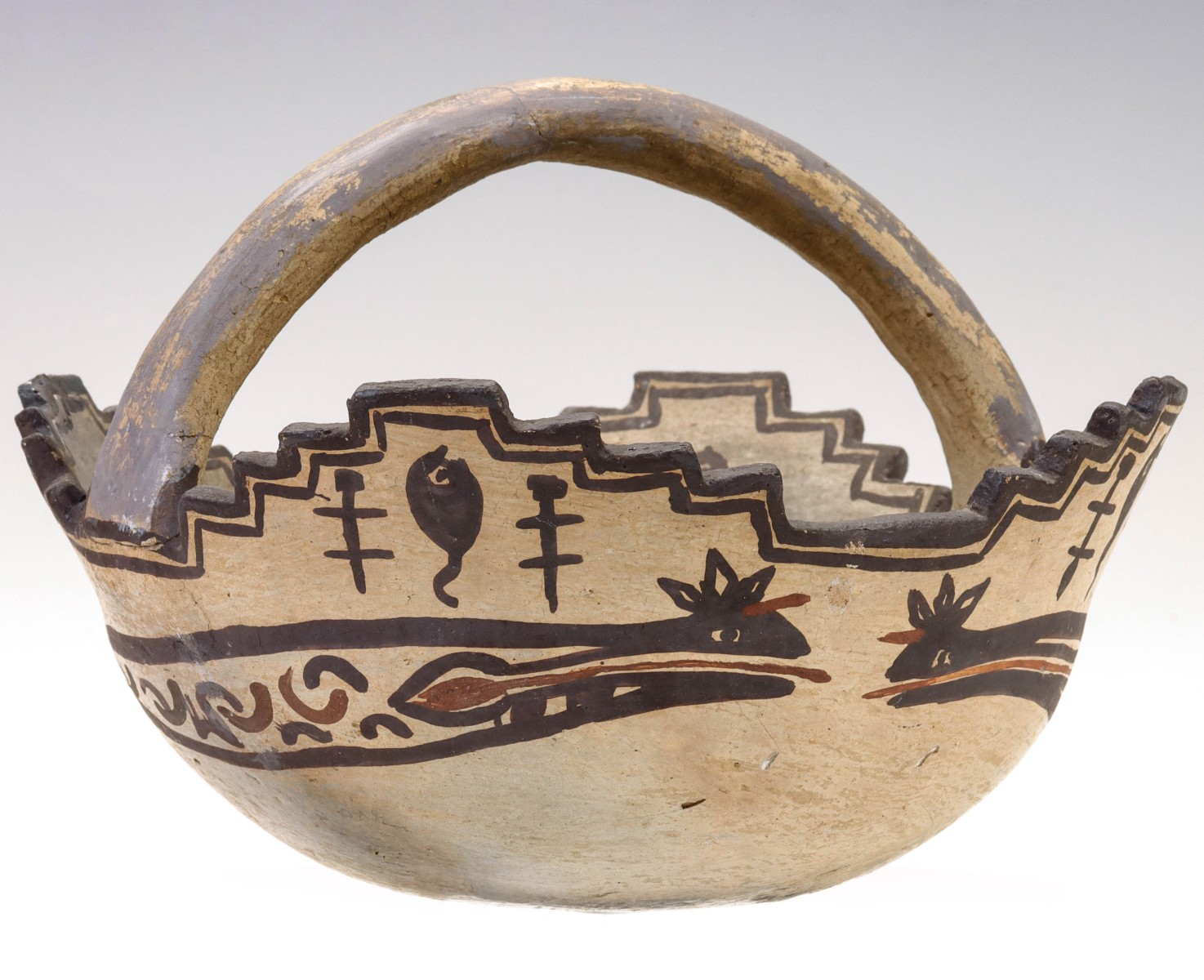 AN ATYPICAL ZUNI POTTERY BASKET WITH HEARTLINE SERPENT