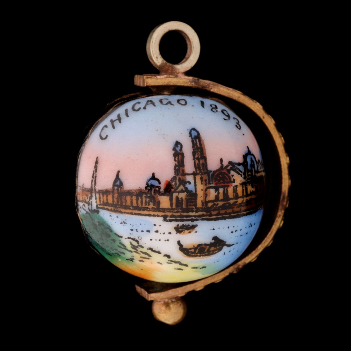 AN ENAMELED ORB WATCH FOB FOR THE 1893 WORLD'S FAIR