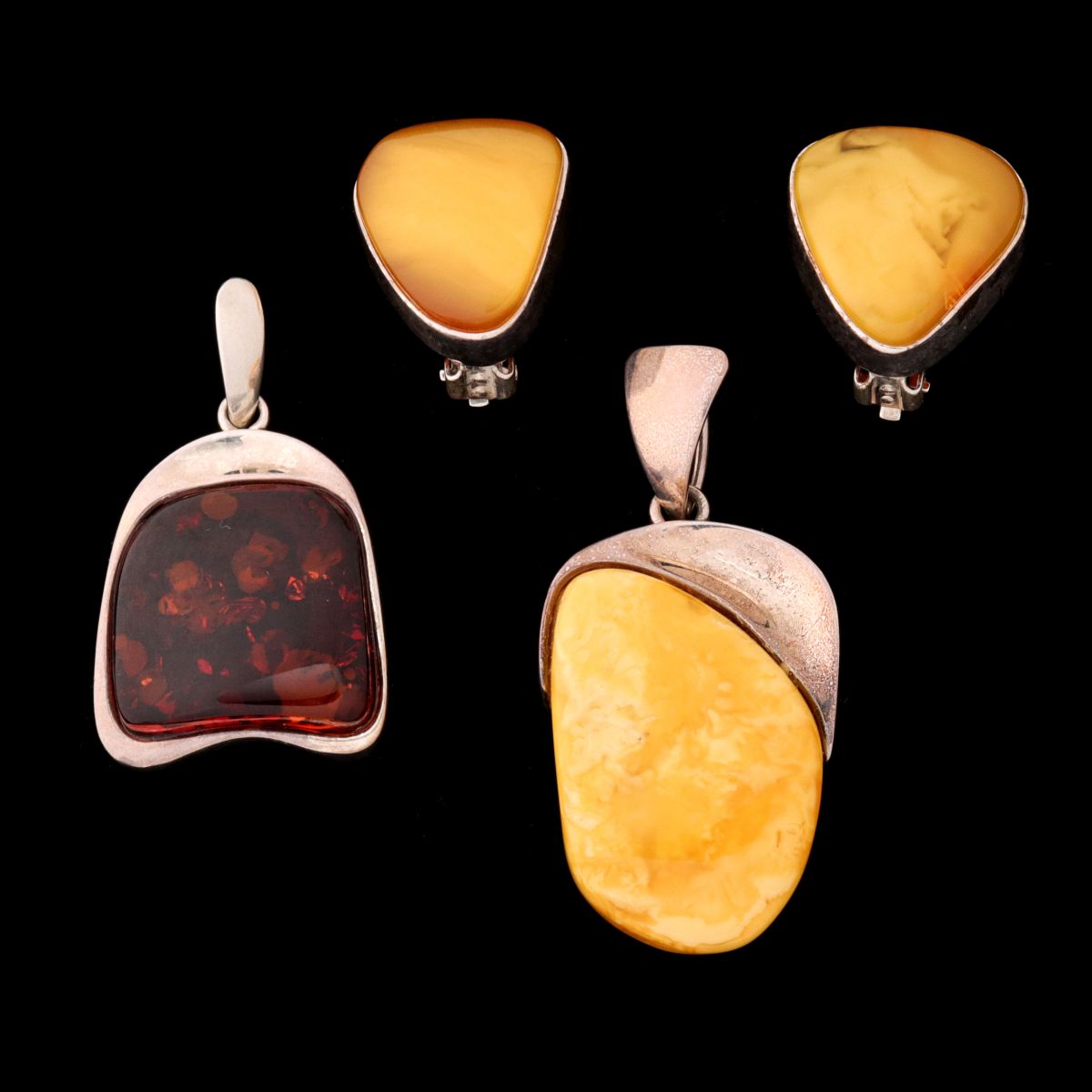 AMBER AND STERLING SILVER EARRINGS AND PENDANTS