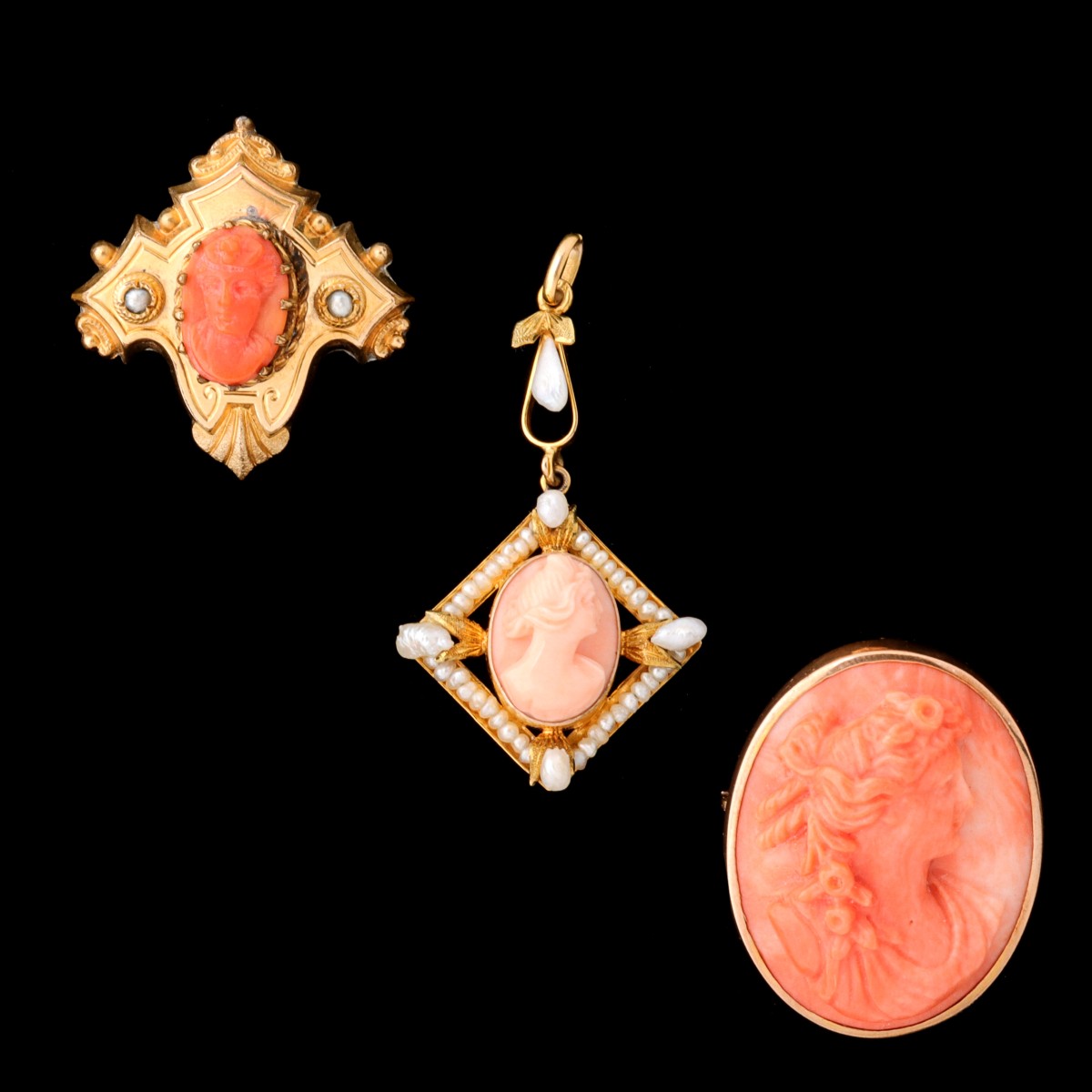 #5932: THREE EXAMPLES OF VICTORIAN CARVED CORAL CAMEO JEWELRY