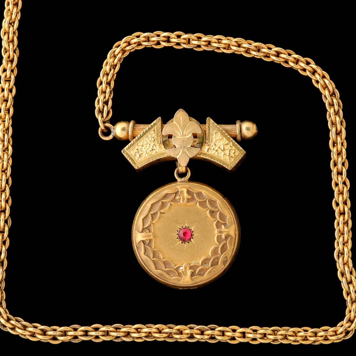 A BLACKINTON VICTORIAN LOCKET ON DOUBLE LINK CHAIN