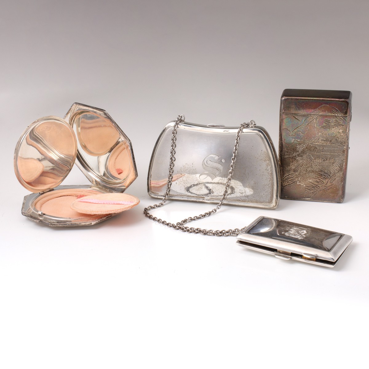 FOUR VINTAGE STERLING SILVER CARRYING CASES