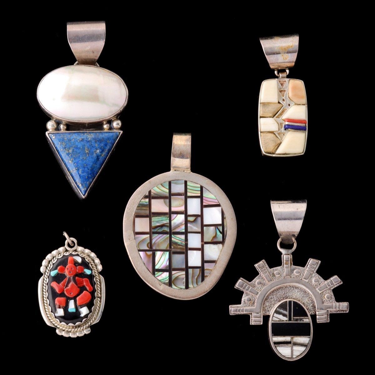 A COLLECTION OF FIVE INLAID ARTIST SIGNED PENDANTS