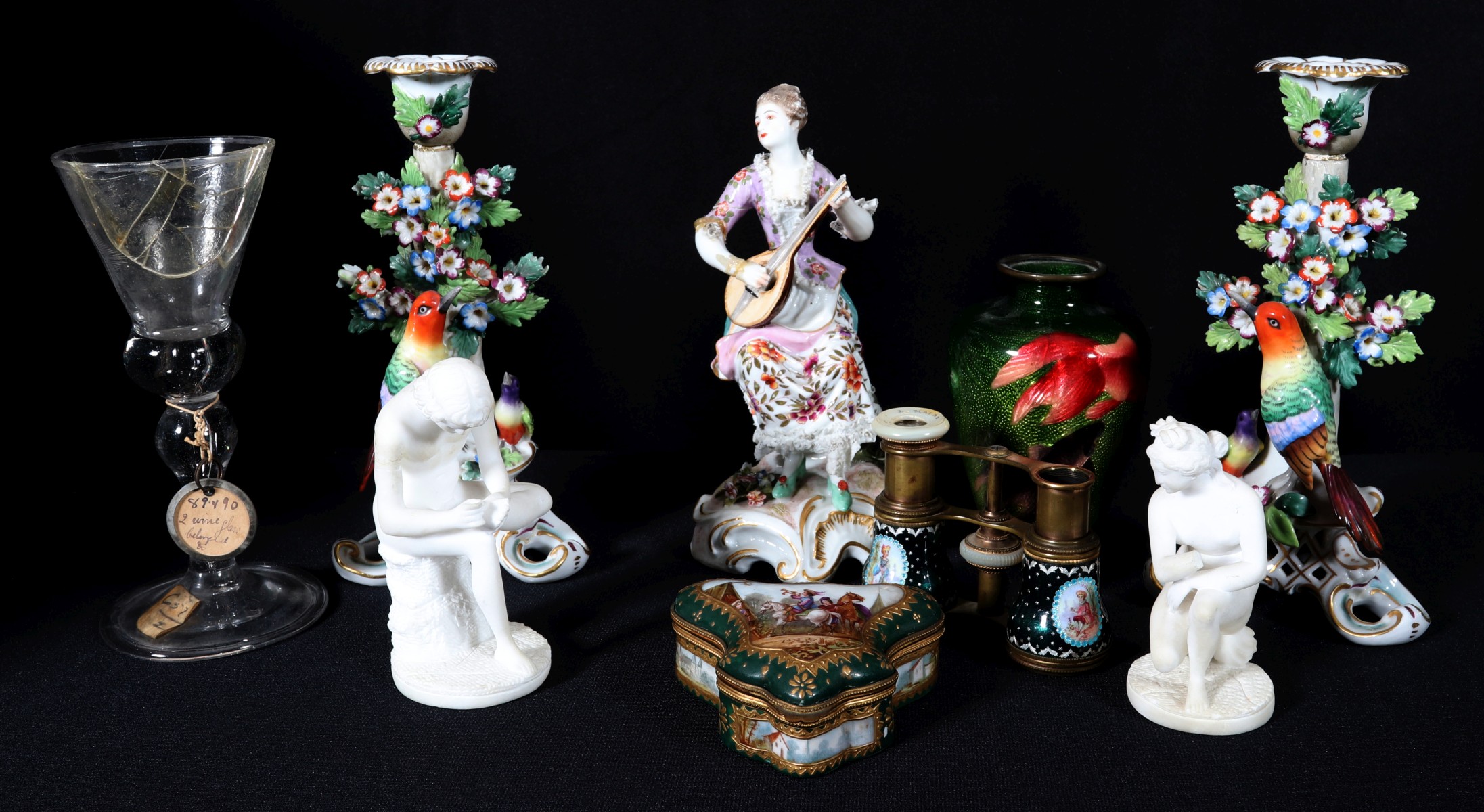 A COLLECTION OF ANTIQUE ITEMS WITH DAMAGE