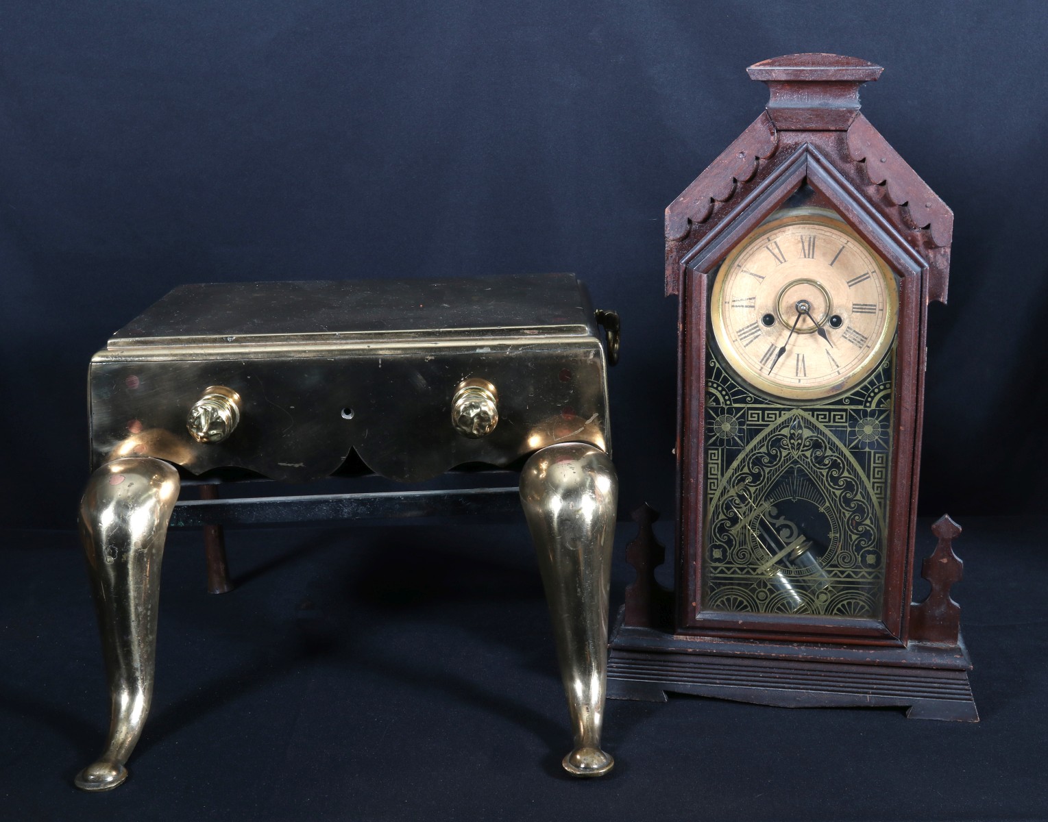 ANTIQUE BRASS FIREPLACE TRIVET AND ANTIQUE PARLOR CLOCK