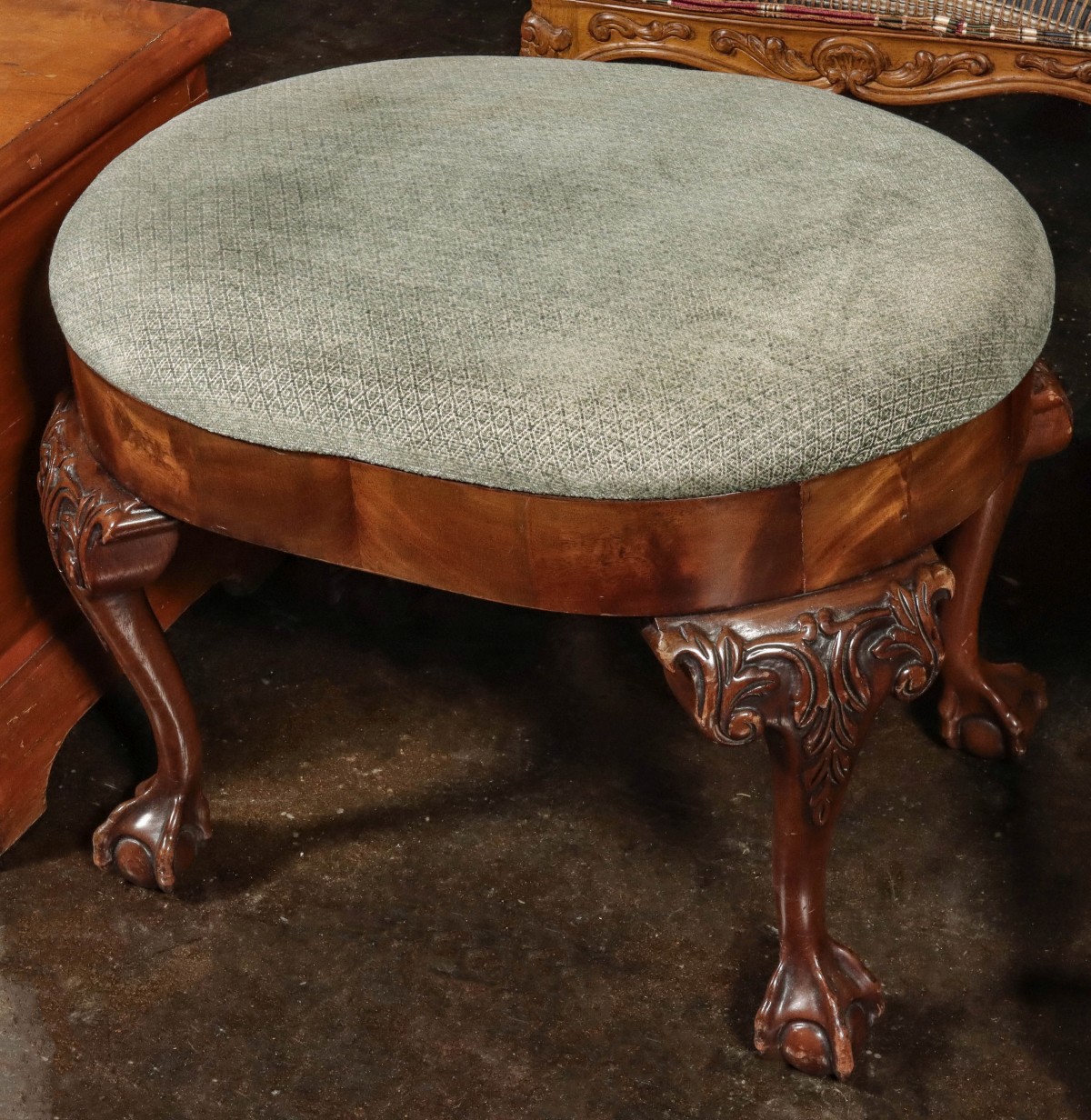 A CHIPPENDALE STYLE OVAL TOP FOOT STOOL