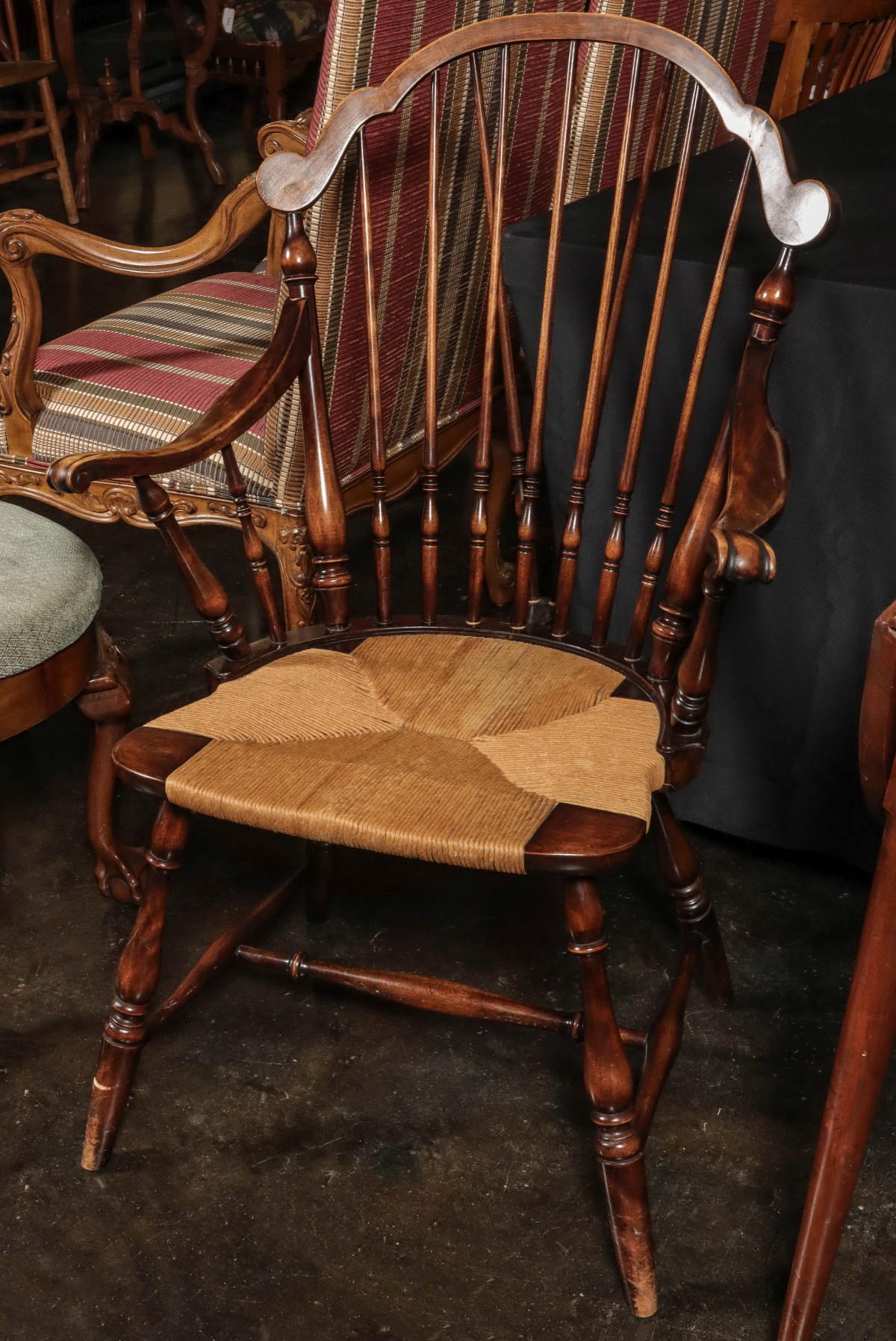 A MODERN WINDSOR STYLE ARM CHAIR WITH RUSH SEAT