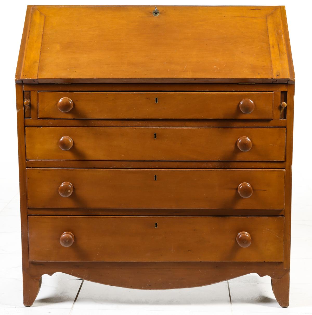 A 19TH CENTURY AMERICAN CHERRY SLANT FRONT DESK C. 1840