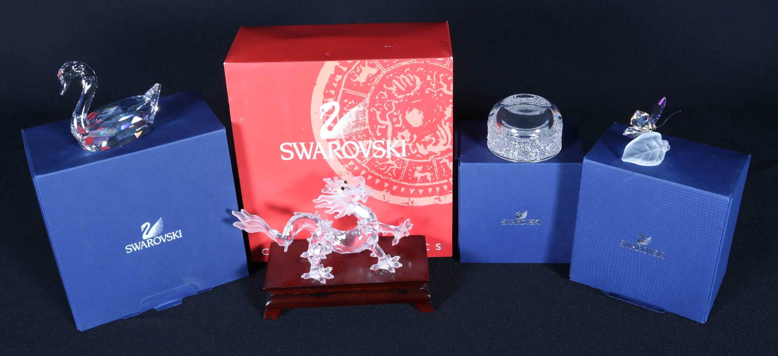 FOUR SWAROVSKI CRYSTAL FIGURES WITH BOXES