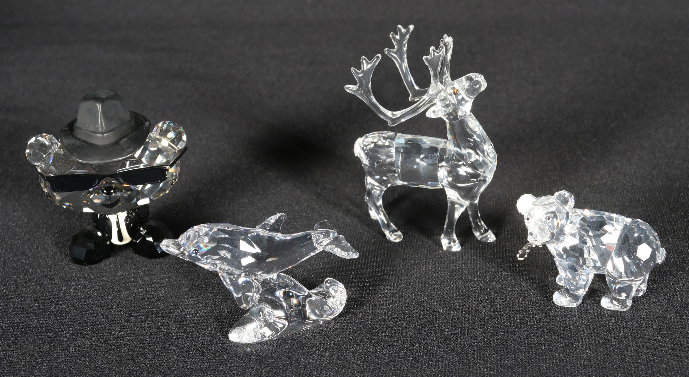 FOUR SWAROVSKI CRYSTAL FIGURES WITH BOXES