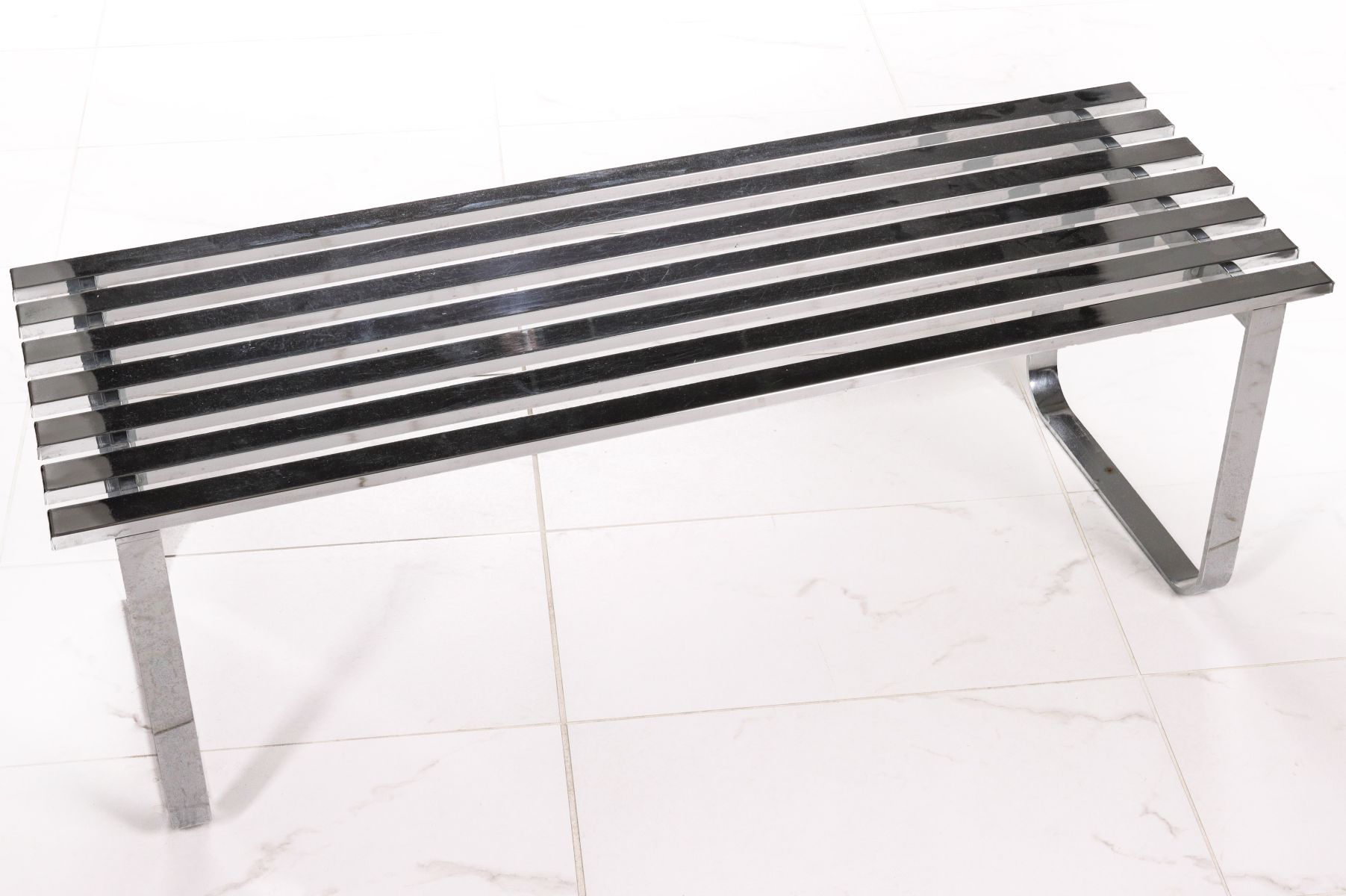 A MODERN SLATTED BENCH IN THE MANNER OF MILO BAUGHMAN