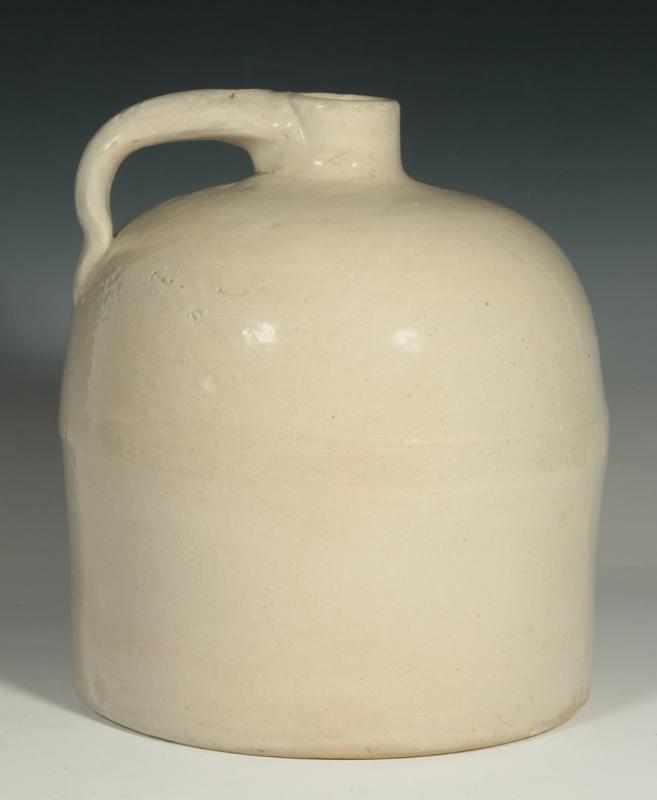 AN ANTIQUE BRISTOL GLAZE STONEWARE JUG