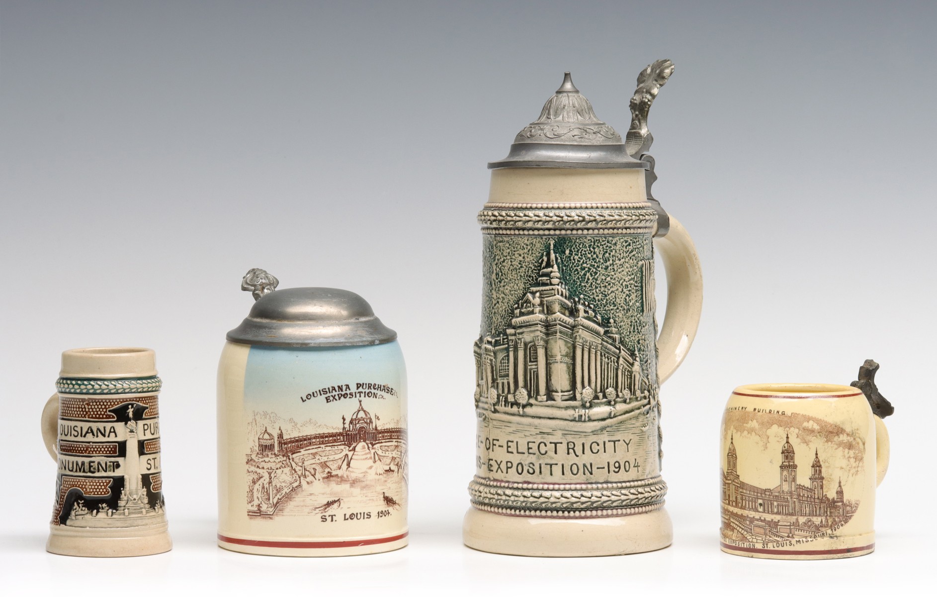 A COLLECTION OF MINIATURE STEINS 1904 WORLD'S FAIR