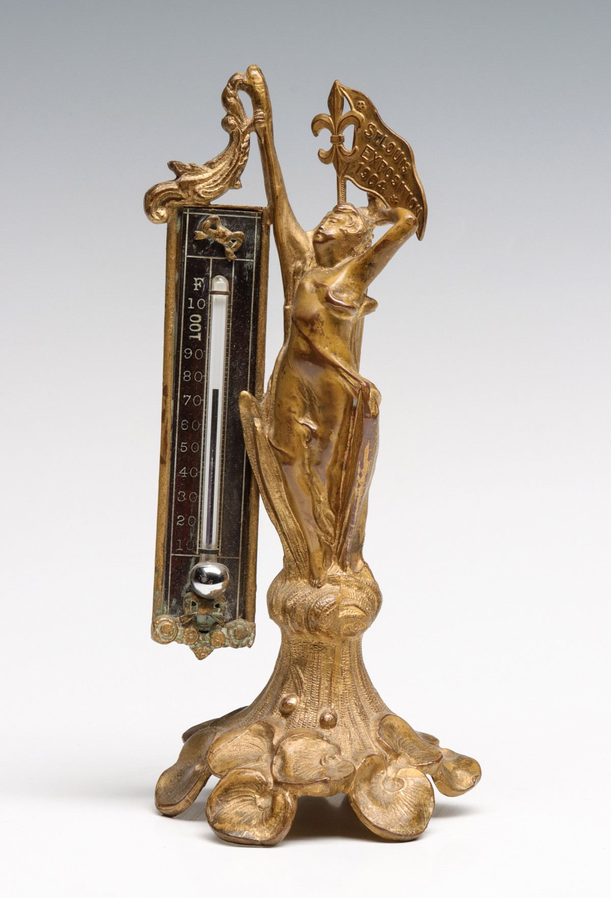 A 1904 ST. LOUIS WORLD'S FAIR SOUVENIR DESK THERMOMETER