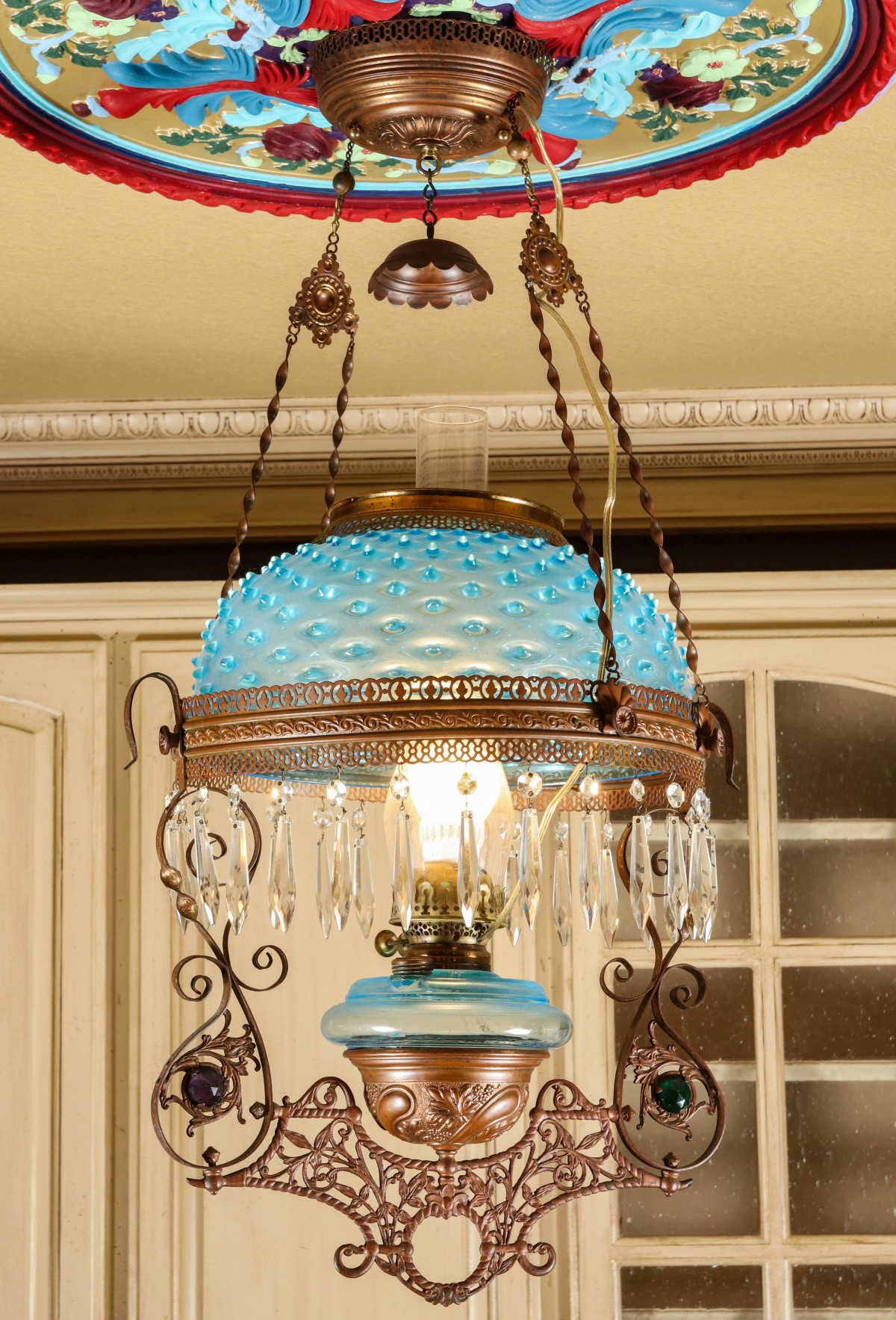 A LIBRARY LAMP WITH BLUE HOBNAIL SHADE & JEWELS