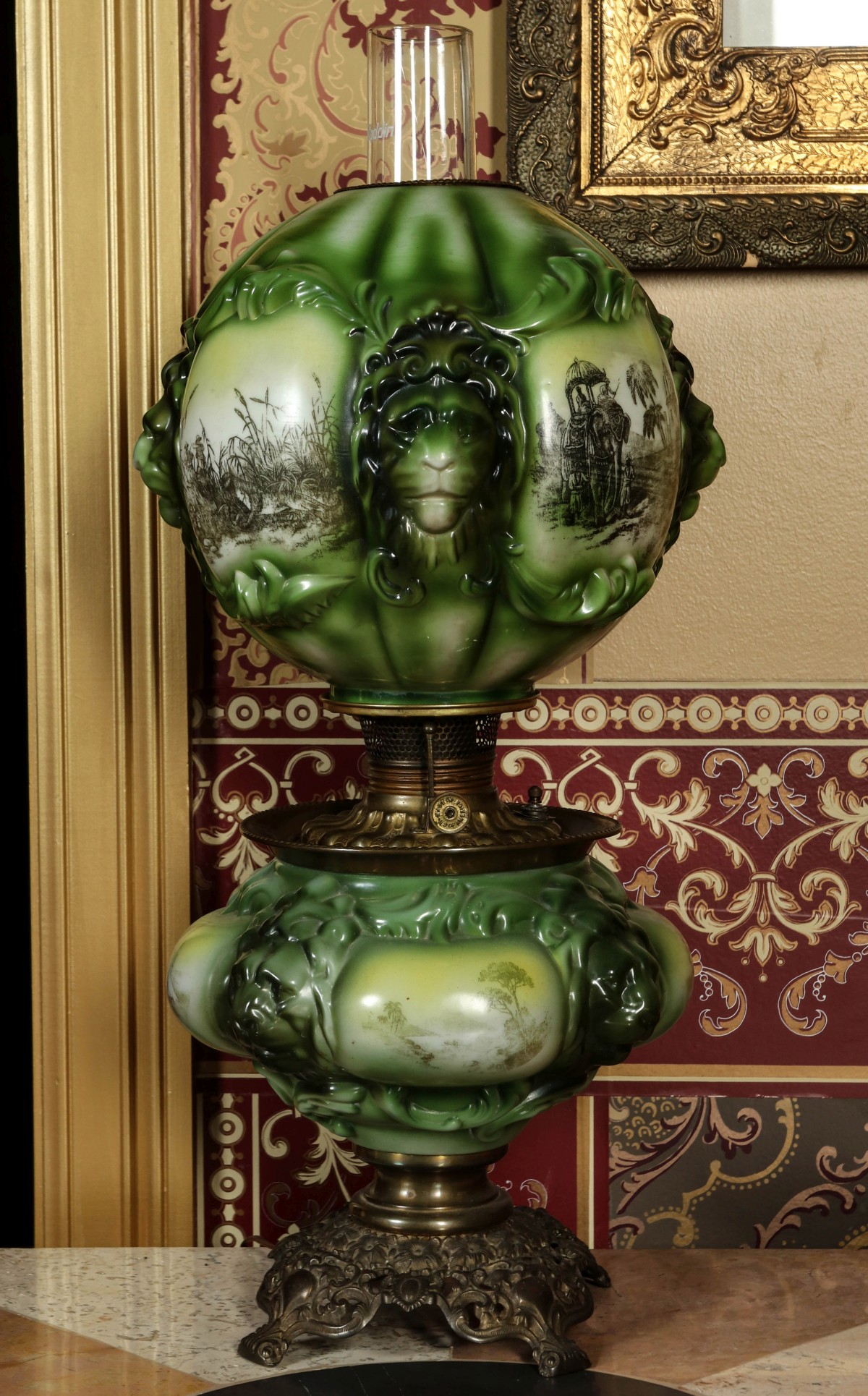 A 19C. PARLOR LAMP WITH LIONS ATTR TO CONSOLIDATED