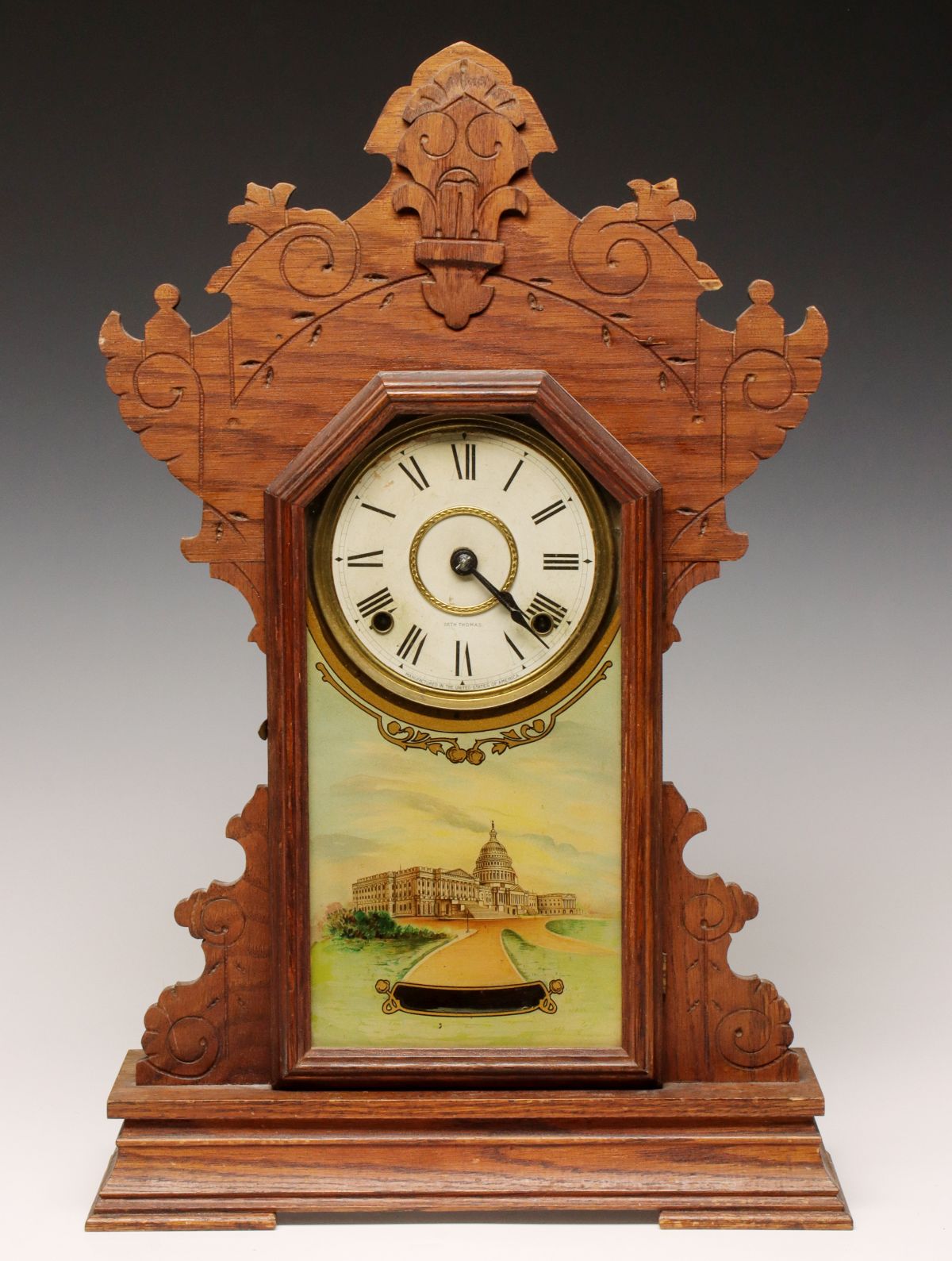 A SETH THOMAS KITCHEN CLOCK WITH U.S. CAPITOL