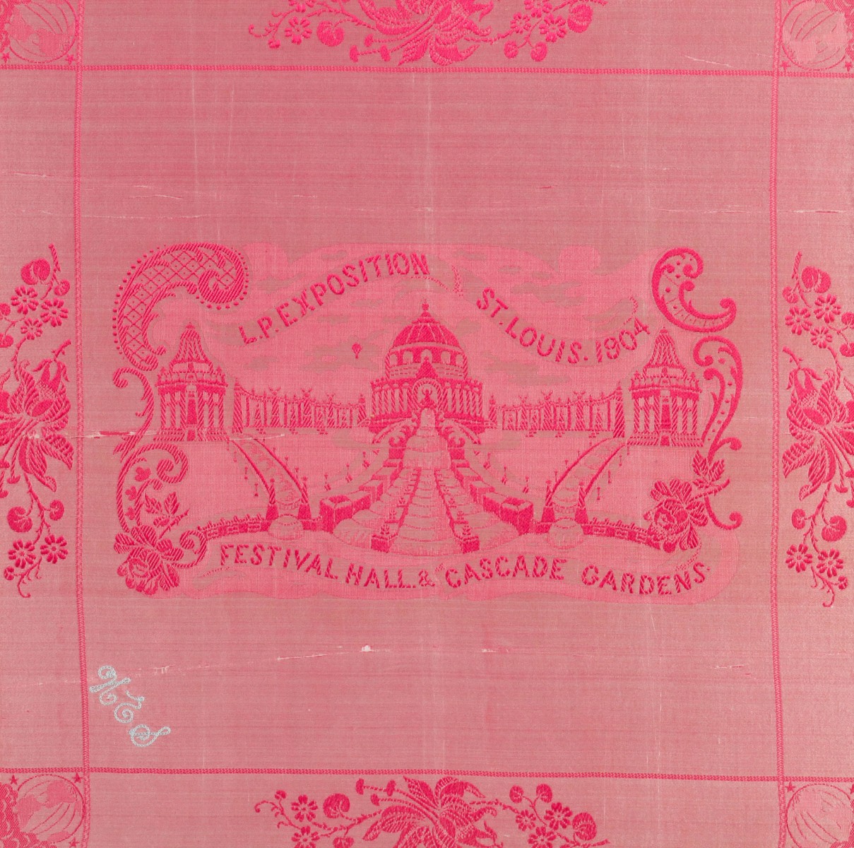 A FRAMED SILK SCARF FROM THE 1904 WORLD'S FAIR